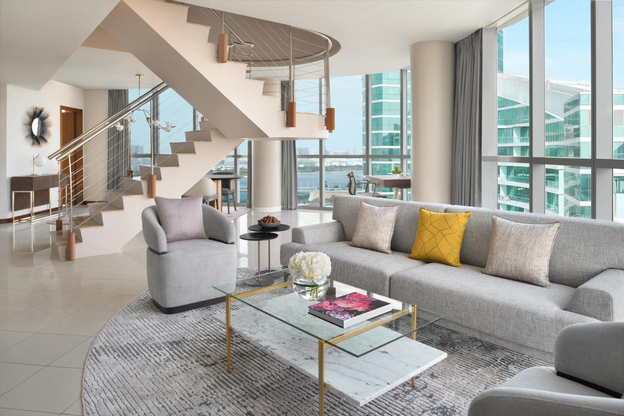 Intercontinental Residence Suites Dubai Festival City By Ihg Luaran gambar A living room in a penthouse at The Ritz-Carlton, South Beach